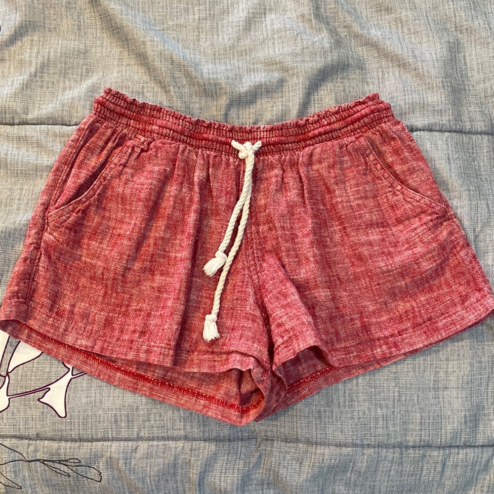 Red cargo shorts with pockets. Size S